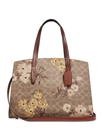 Stylish Bags With Discounts Coach Prairie Coated Canvas Signature Charlie Carryall Affordable Elegance, Grab Yours Stylish Bags With Discounts Coach Prairie Coated Canvas Signature Charlie Carryall Affordable Elegance, Grab Yours